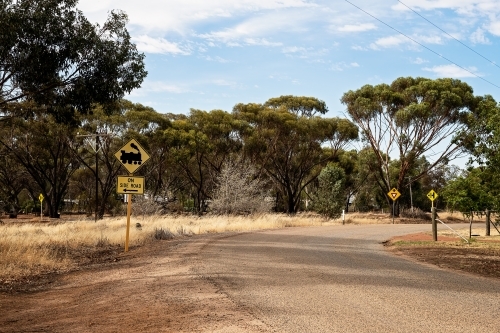 Train crossing road sign in country town - Australian Stock Image