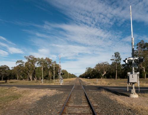 Train lines and a level crossing - Australian Stock Image