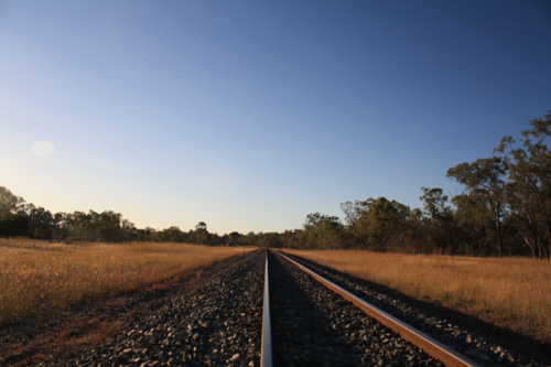 Train tracks in outback landscape - Australian Stock Image