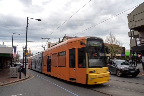 Tram at Glenelg, Adelaide on a cloudy day - Australian Stock Image