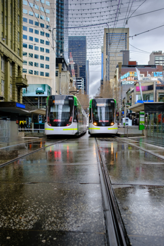 Trams in Melbourne CBD on a Cloudy Wet Day - Australian Stock Image