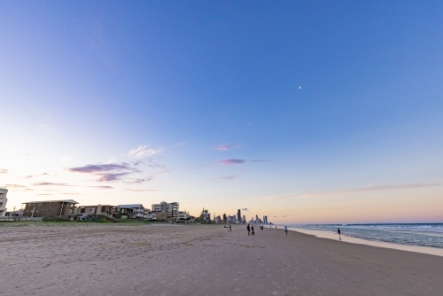 Tranquil beach afternoon with view of the Gold Coast city skyline - Australian Stock Image