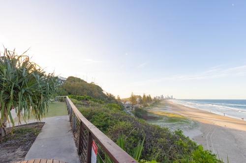 Tranquil beach afternoon with view of the Gold Coast city skyline - Australian Stock Image