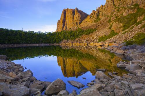 Tranquil Tarn and Denison Crag - Australian Stock Image