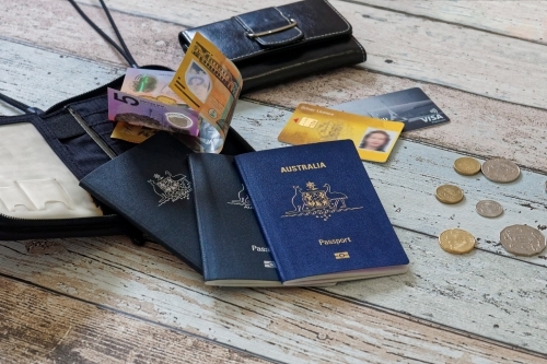 Travel documents, passport, driver's license, credit cards, money - Australian Stock Image