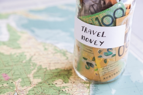 Travel in Australia concept with money and map
