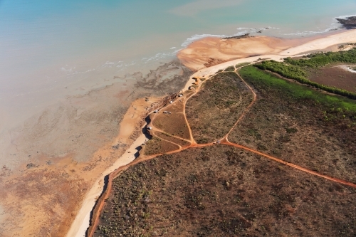 Travellers with caravans exploring Northern Territory beach - Australian Stock Image