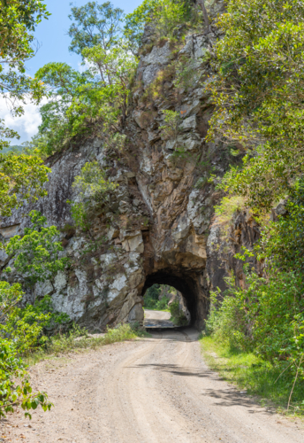Tunnel through solid rock hand dug during the 1800's on the old grafton road - Australian Stock Image