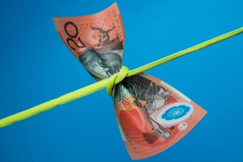 Twenty Dollar Note Tied in a Knot - Australian Stock Image