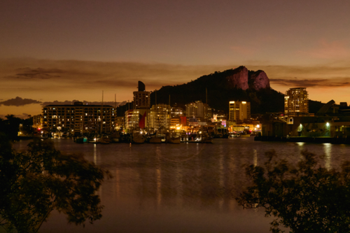 Twilight view of Townsville with Castle Hill in background - Australian Stock Image