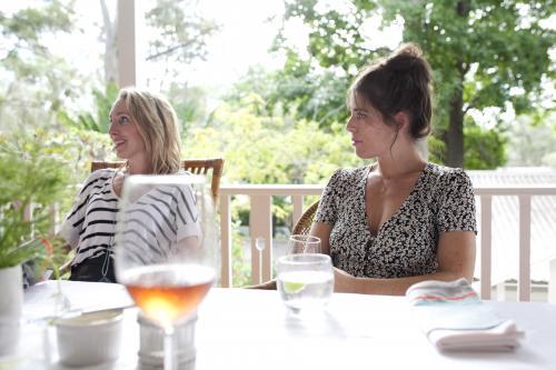 Two girls sitting at lunch - Australian Stock Image