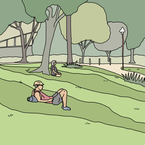 Two people relaxing beneath trees on green grassy slope in park - Australian Stock Image