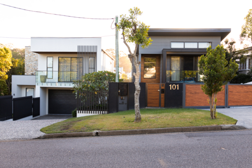 two very modern houses next to each other in an established suburb - Australian Stock Image