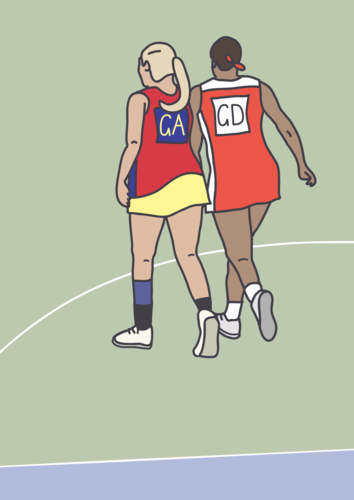 Two women in action on netball court on game day - Australian Stock Image