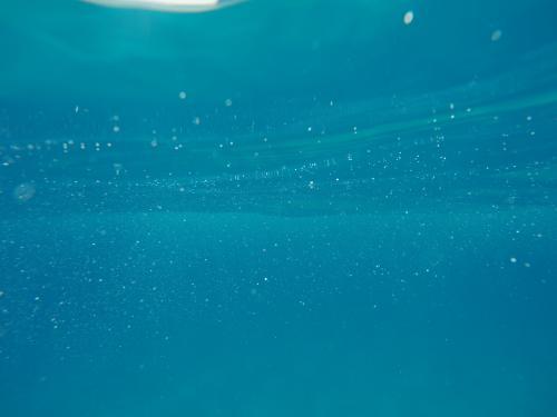 Underwater clear blue ocean bubbles
