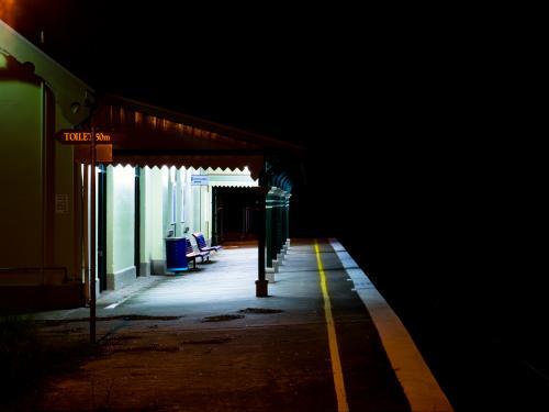 Uralla Railway Station platform at night - Australian Stock Image