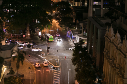 Urban intersection at night-time viewed from elevated viewpoint - Australian Stock Image
