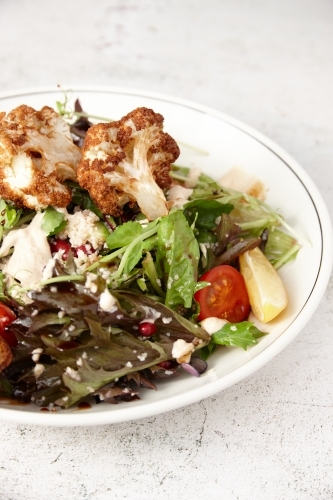 Vegetarian cauliflower salad in bowl - Australian Stock Image