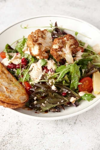 Vegetarian cauliflower salad in bowl - Australian Stock Image
