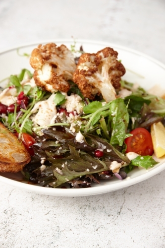 Vegetarian cauliflower salad in bowl - Australian Stock Image