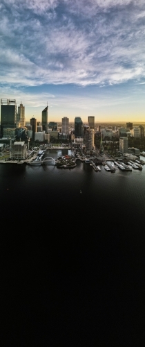 Vertical aerial view of Perth cityscape across Swan River