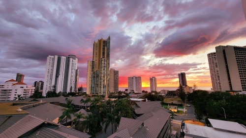 Vibrant sunrise over the beach at Surfers Paradise on the Gold Coast - Australian Stock Image