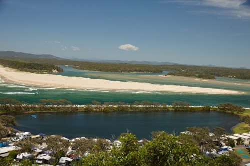 View above caravan park next to estuary - Australian Stock Image