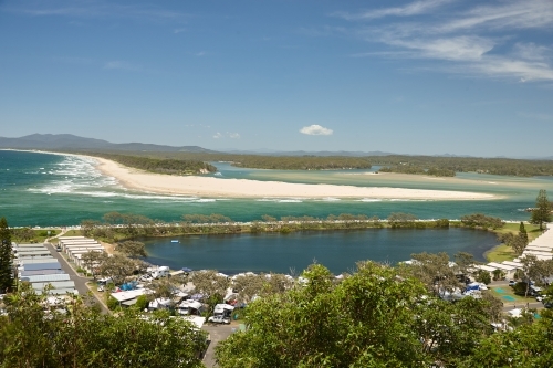 View above caravan park next to estuary - Australian Stock Image