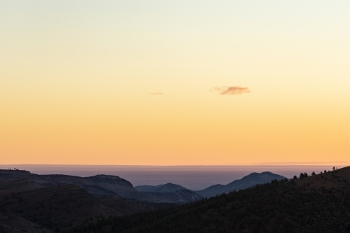 view across hills at sunset - Australian Stock Image