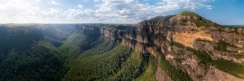 View down the Grose Valley in the NSW Blue Mountains with Mount Banks in foreground - Australian Stock Image