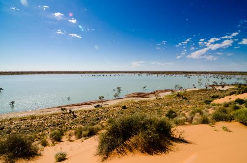 View of a lake that formed beside Big Red in the Simpson Desert after a big wet season - Australian Stock Image