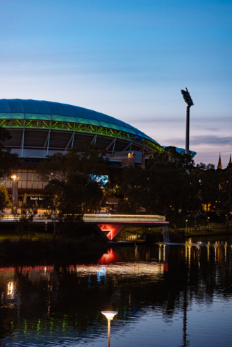 View of Adelaide Oval across the River Torrens in the evening - Australian Stock Image