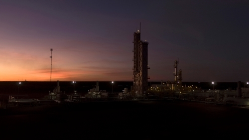 View of an industrial plant at sunrise - Australian Stock Image
