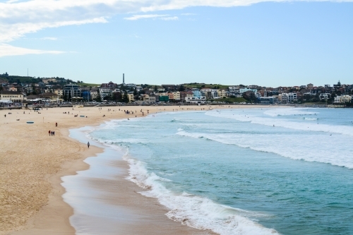 View of beach with lapping waves - Australian Stock Image
