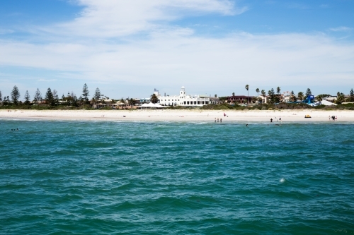 view of beachfront buildings across water - Australian Stock Image