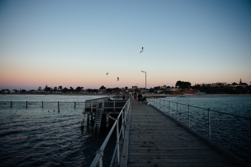 View of Moonta Bay from pier at sunset - Australian Stock Image