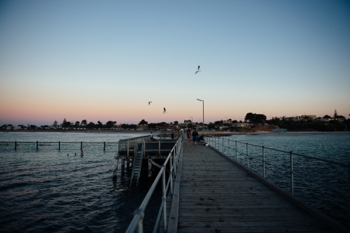 View of Moonta Bay from pier at sunset