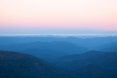 View of mountain ranges at sunset