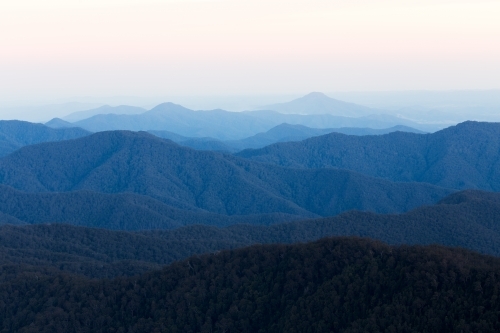 View of mountain ranges fading into the distance - Australian Stock Image