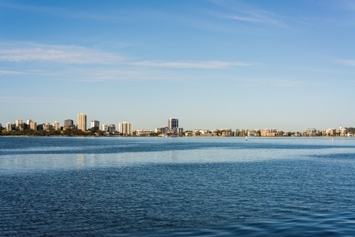 View of South Perth skyline across the tranquil blue Swan River Lake - Australian Stock Image