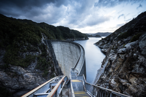 View of the Gordon Dam on a cool summer day. - Australian Stock Image