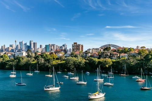 View of yachts in harbour with Sydney city behind - Australian Stock Image