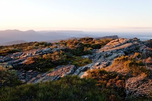 View over mountain range in late afternoon - Australian Stock Image