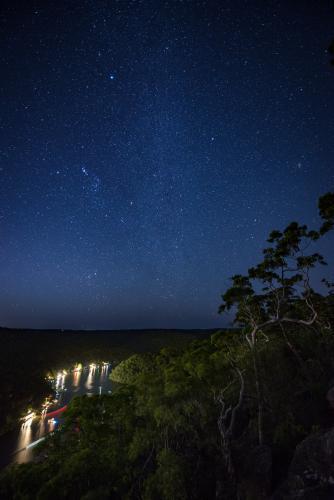 View over river homes at Berowra Waters at night - Australian Stock Image