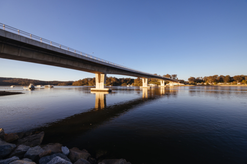 Views from Foreshore Park in Batemans Bay along the Clyde River on a warm sunny spring evening - Australian Stock Image