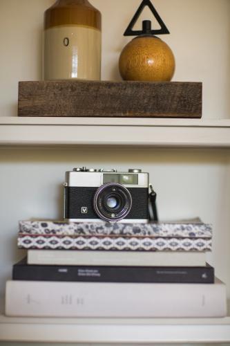 vintage camera on shelf - Australian Stock Image