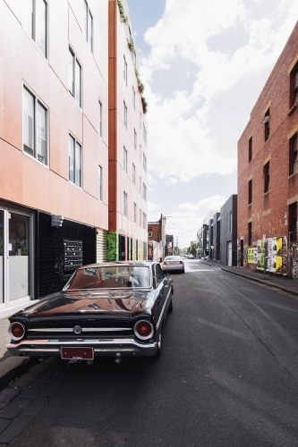 Vintage car parked in urban street