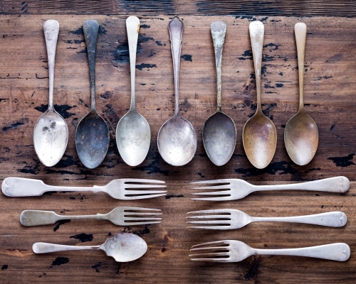 Vintage Cutlery Lay Out On Rustic Wooden Table