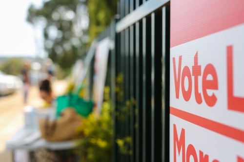 Vote sign outside a polling booth at an election - Australian Stock Image