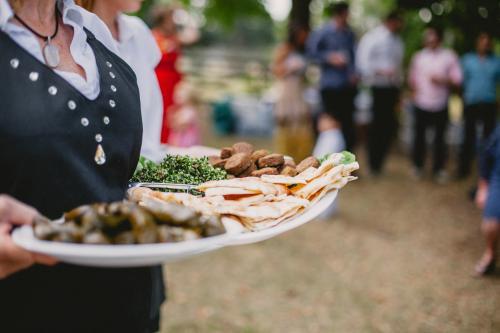 Waiter holding food at event